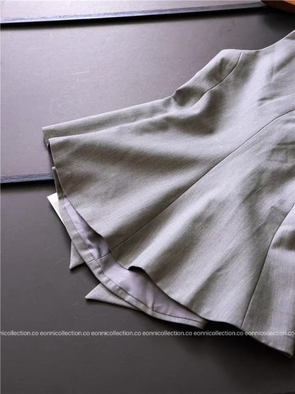 #1095 Elegant Backless Sleeveless Top – Bow & Peplum Design